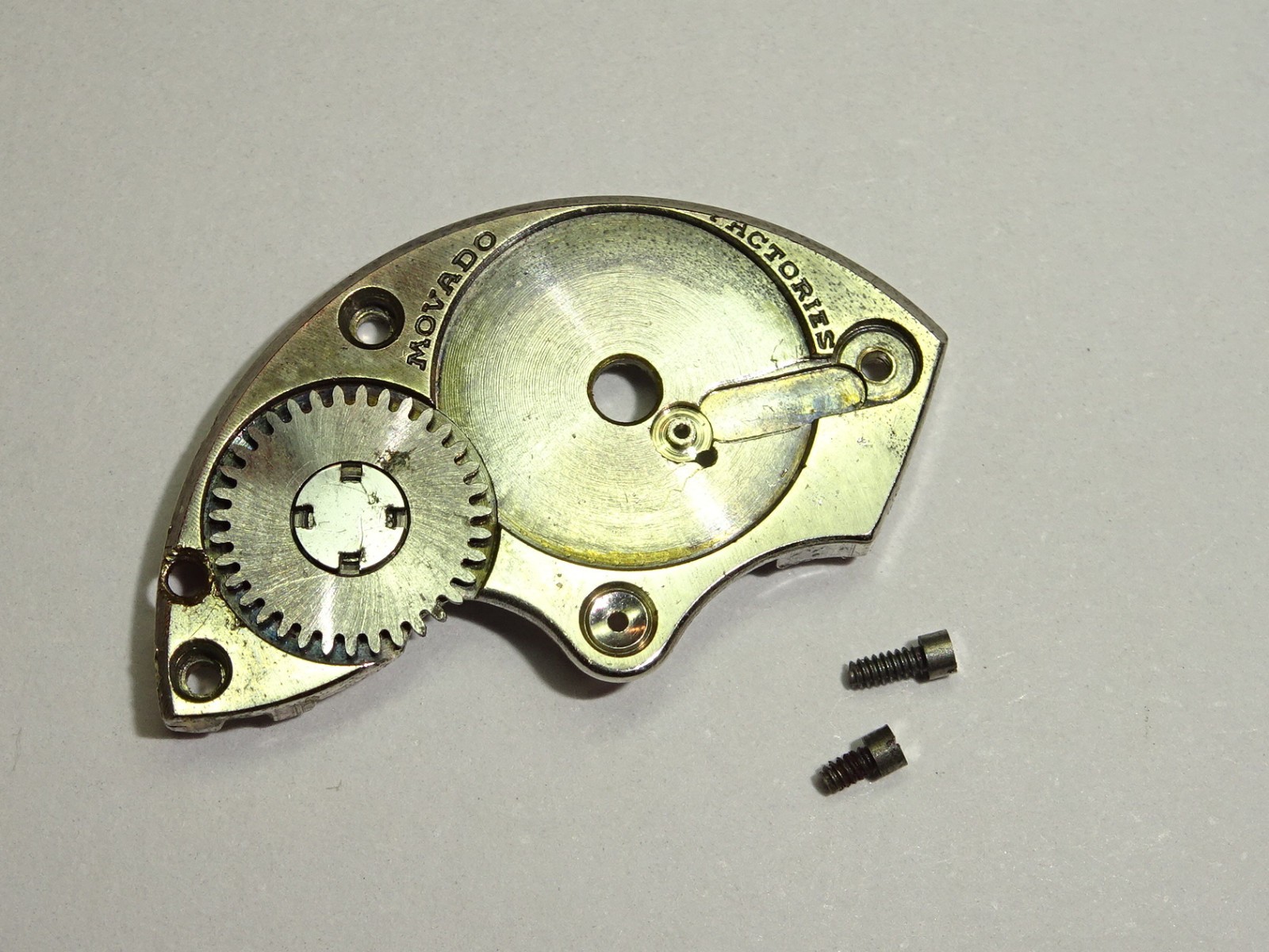 Movado barrel bridge + screws cal. 470 473 475 / part 105